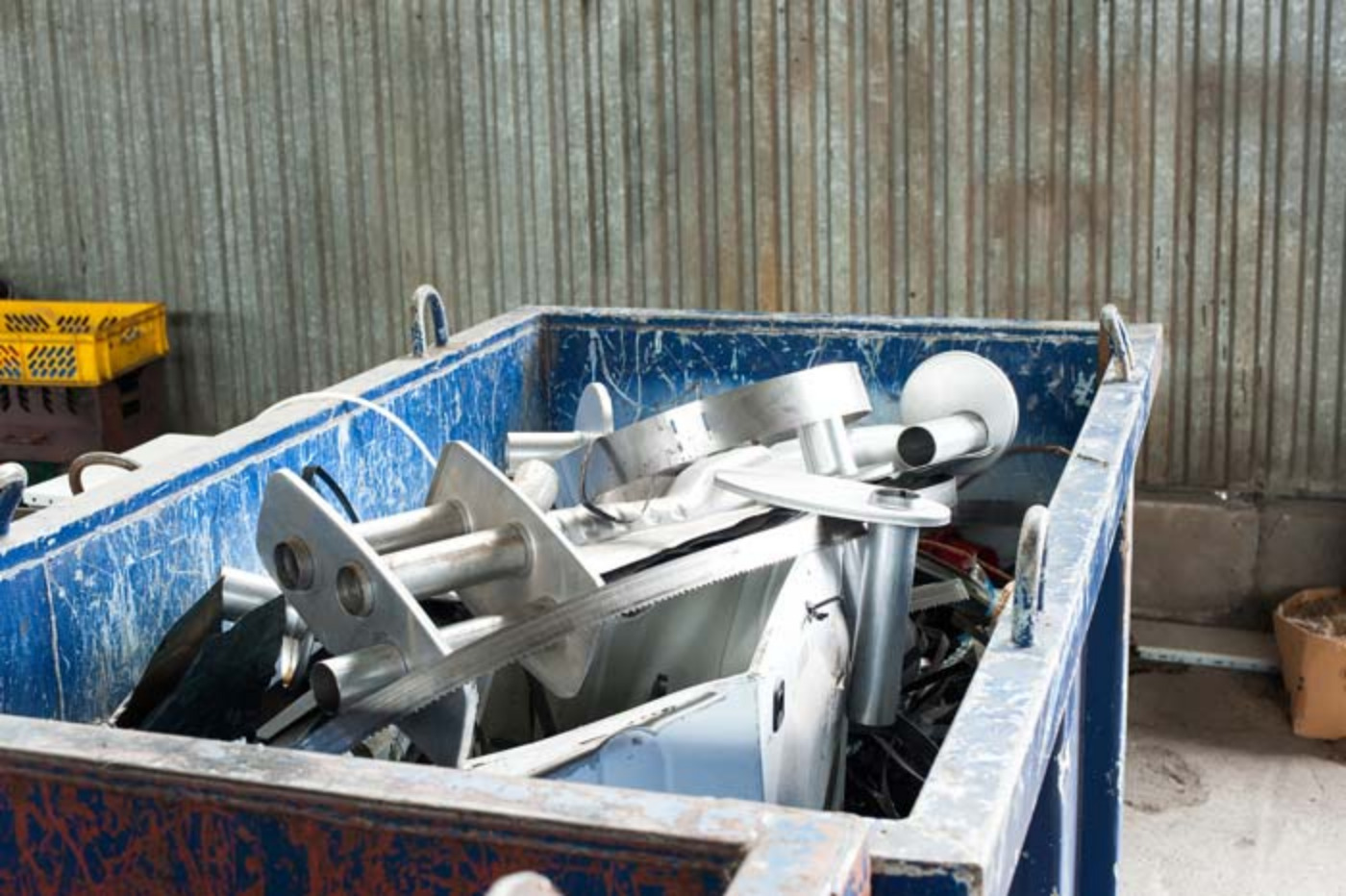 top view of full debris removal dumpster container