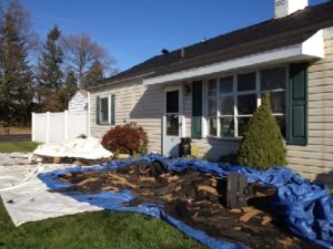 dumpster roofing tile debris cleanup